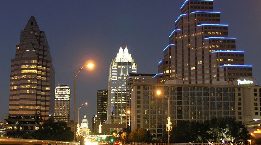 Downtown Austin at night featuring the Frost Tower and One Congress Plaza