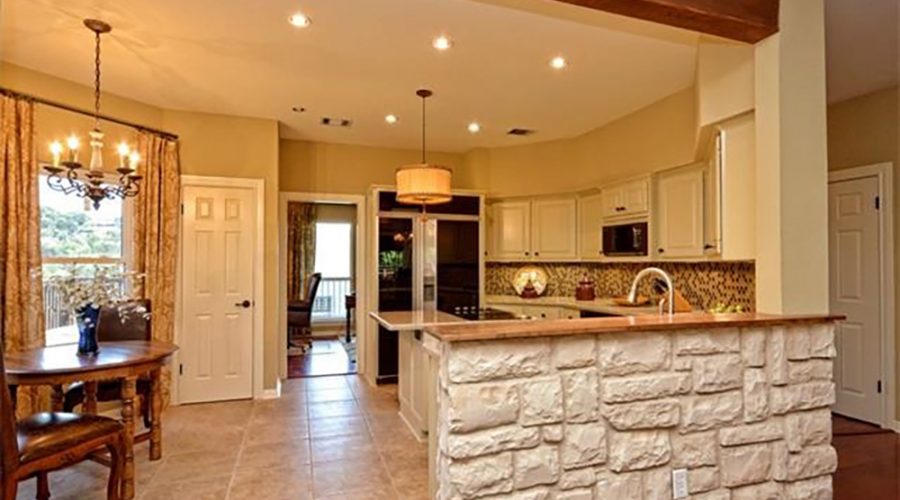 Interior of a home, showing the kitchen and dining area