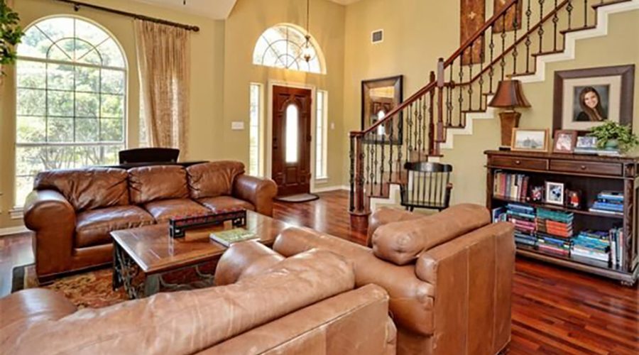 Interior shot of a living room and staircase in a luxury home