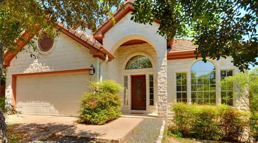 A photograph of the front of a contemporary home in Austin, TX