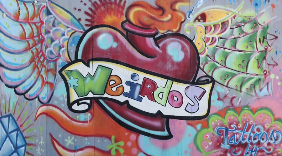multi-colored mural that says 'weirdos'