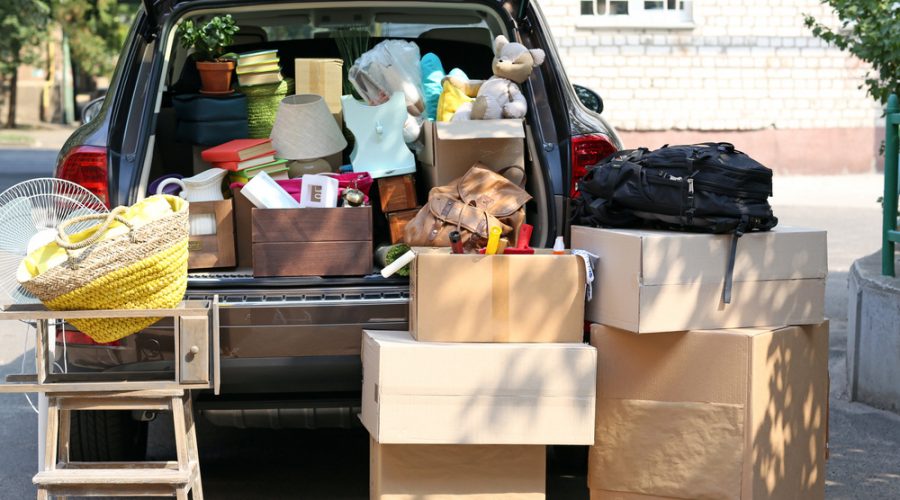 A station wagon filled with boxes in preparation for a move.