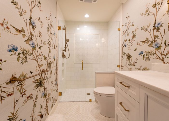 Botanical Wallpaper in a Bathroom Elegant bathroom with botanical wallpaper and glass shower
